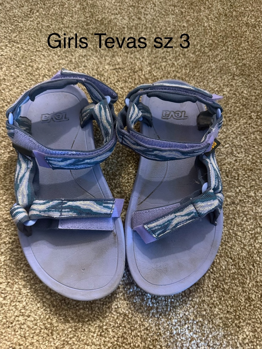 Teva Girls' purple sandals - Size 3. Can use a wash but fine other than that
